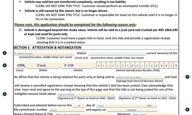 Part of our filled-in example of Kentucky TC 96-351, Application to Junk a Vehicle Title, showing the filled-in entries